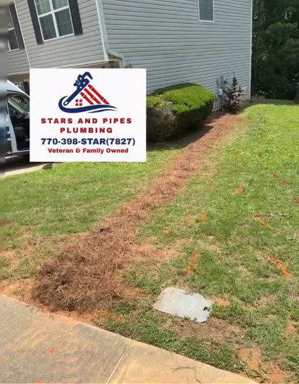 Backfilled, seeded with straw, and cleaned up - the yard on our way out.
