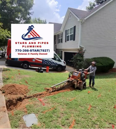 Trenching the new water service line route across the front yard, starting from the meter.