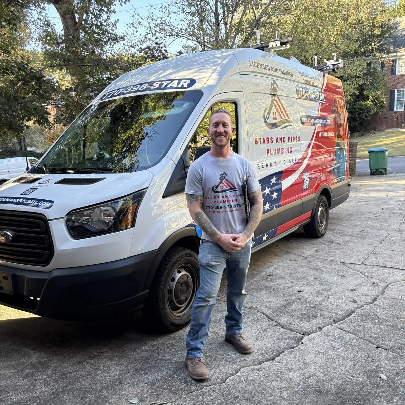 Sean Nelson, U.S. Army veteran and owner of Stars and Pipes Plumbing Atlanta, in uniform shirt