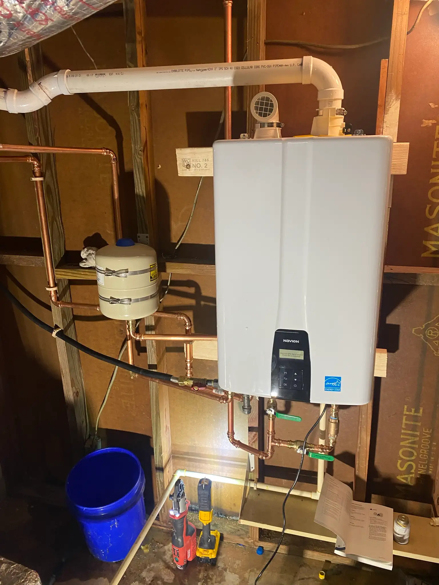Navien tankless water heater installed with new copper piping by Stars and Pipes Plumbing Atlanta