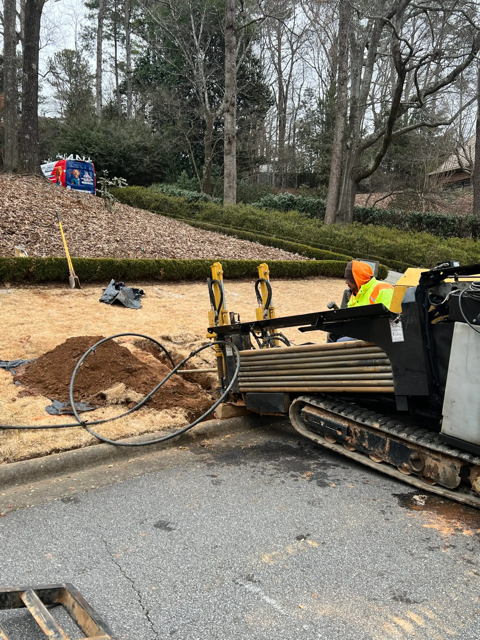 Trenchless water service line replacement in progress with the Stars and Pipes Plumbing Atlanta van on site
